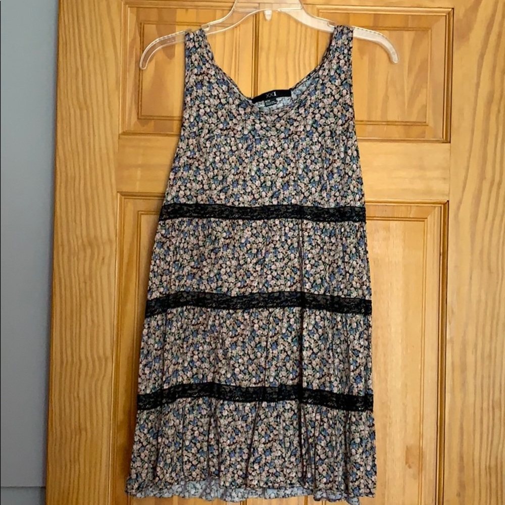 Never worn floral top with black lacing!